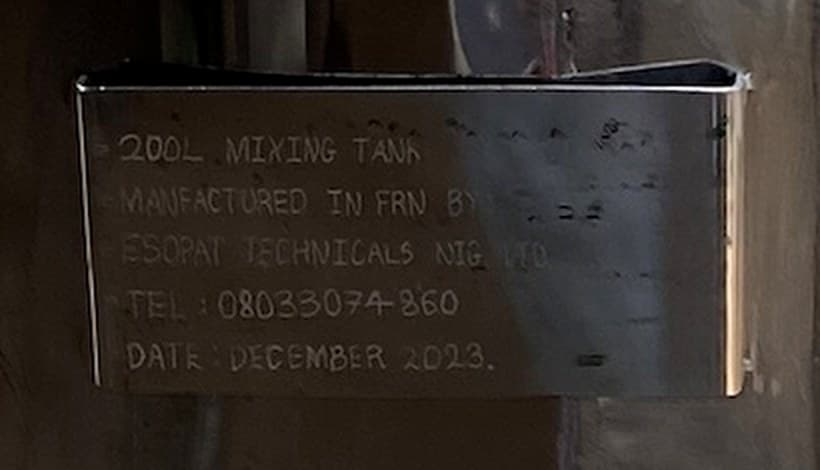 Engraved nameplate on an Esopat Technicals mixing tank